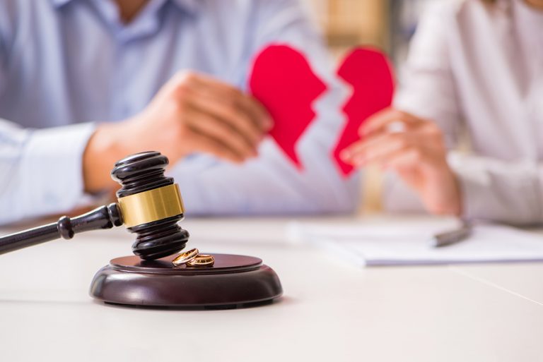 Judge gavel deciding on marriage divorce